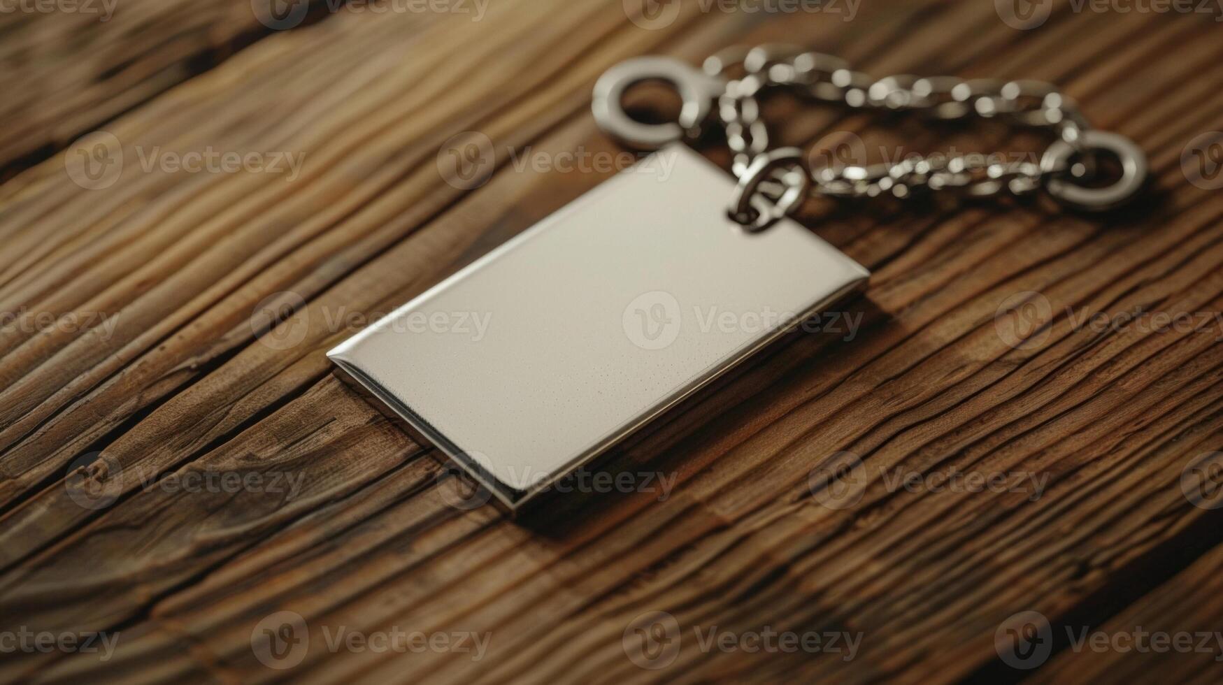 Blank mockup of a charm necklace style keychain with a blank pendant for engraving. photo