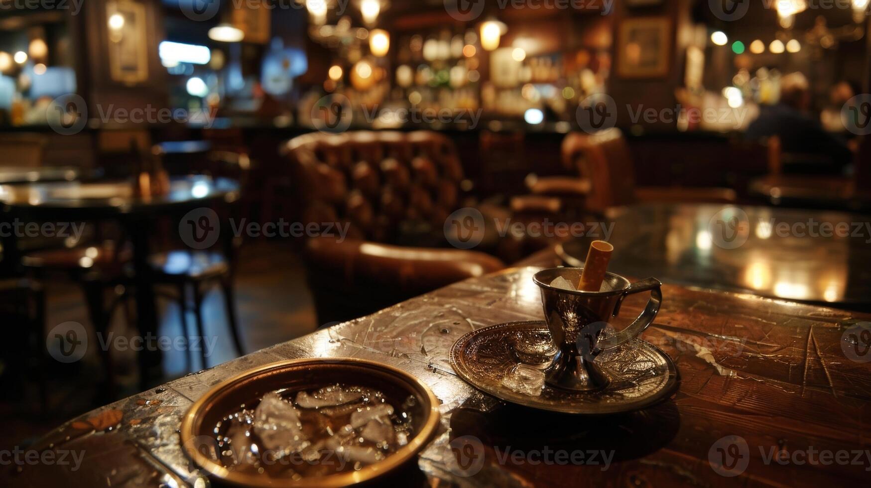A vintage cigarette holder rests in an ashtray on one table adding to the authenticity of the speakeasy experience photo