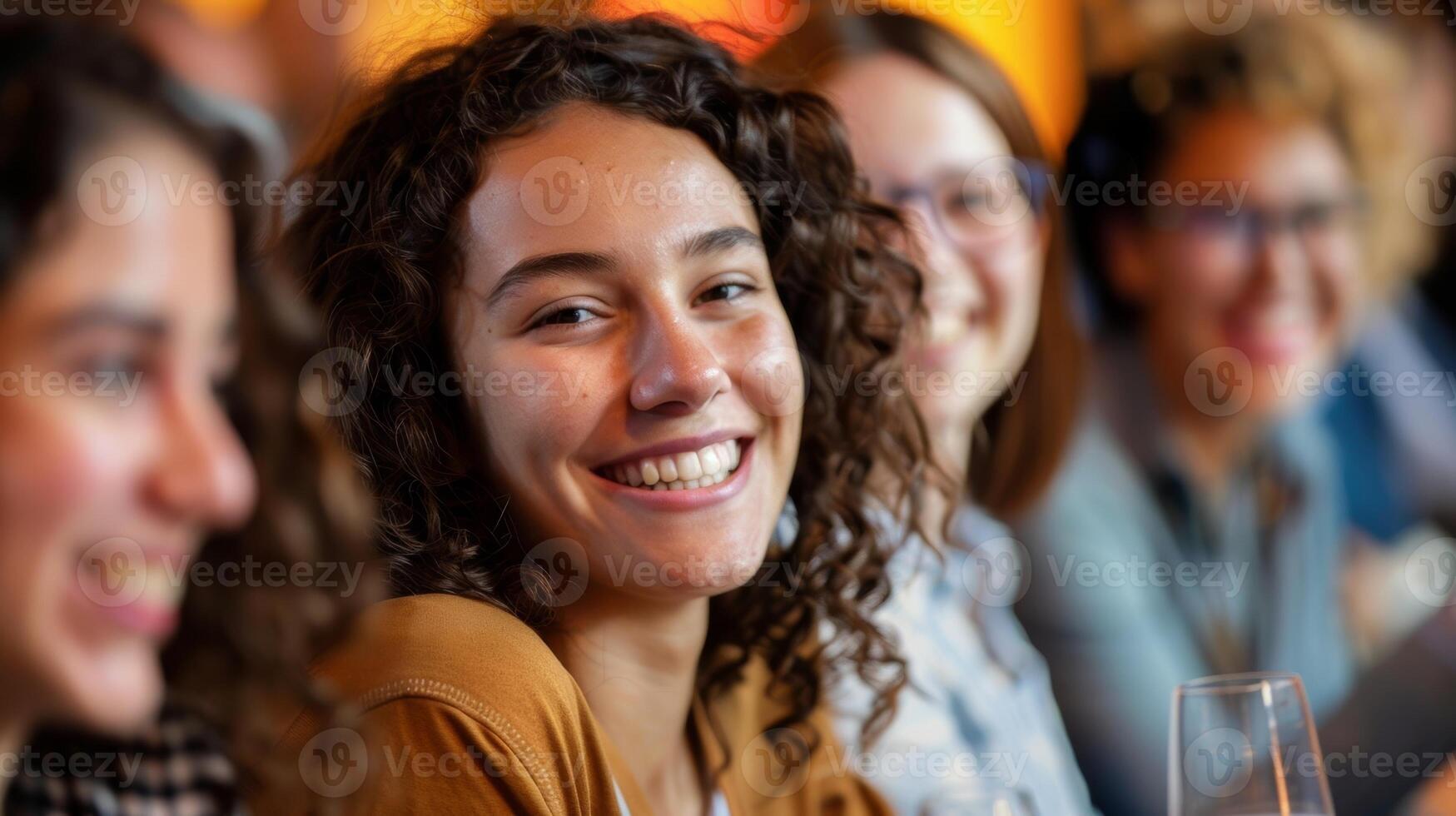 A group photo of attendees at an alcoholfree networking event with satisfied and happy expressions