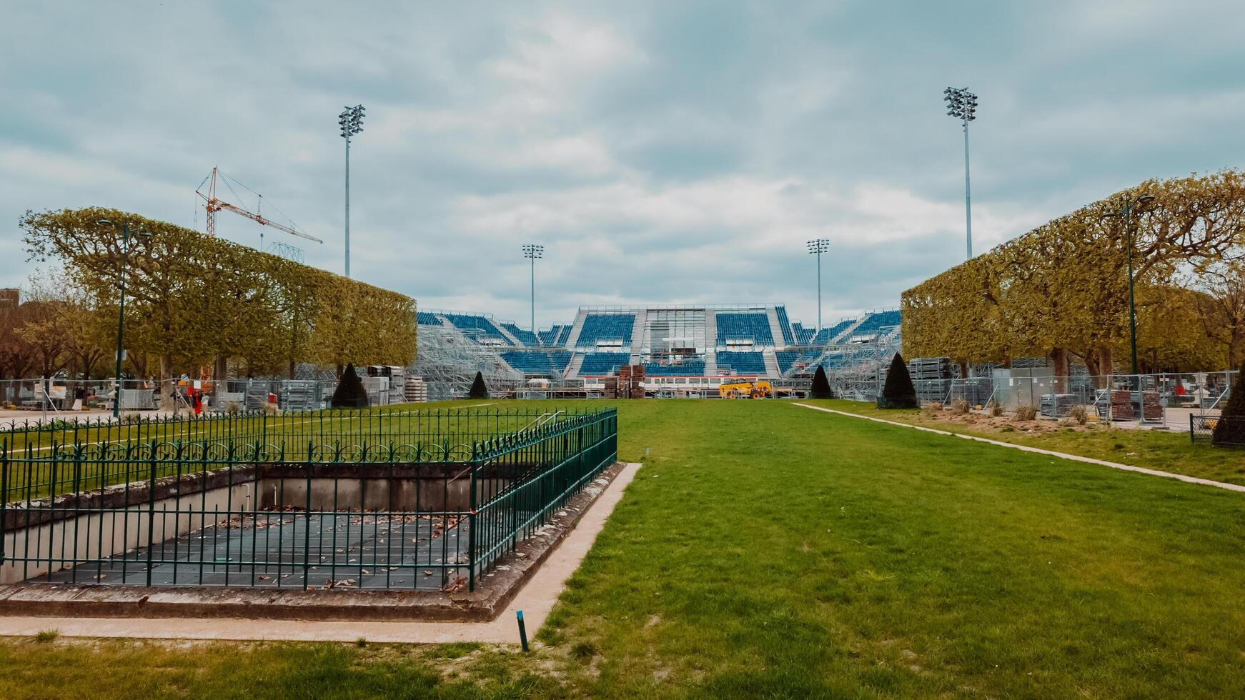 Renovation of a sports stadium in Paris, France, on April 14th, 2024, showcasing urban development and preparation for upcoming sporting events photo