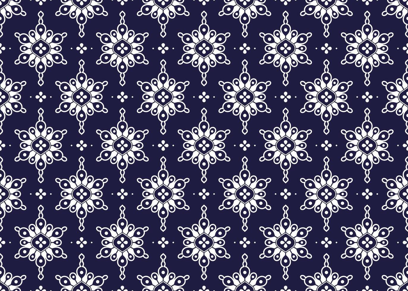 White geometric and symbol flowers design on dark blue background, ethnic fabric seamless pattern design for cloth, carpet, batik, wallpaper, wrapping etc. vector