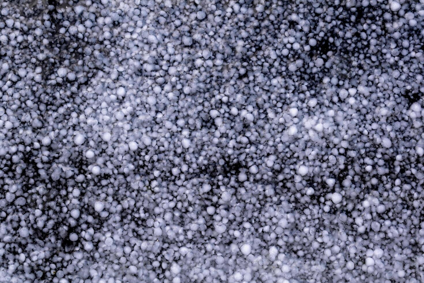 Hail balls in march, natural springtime weather, can cause damages photo