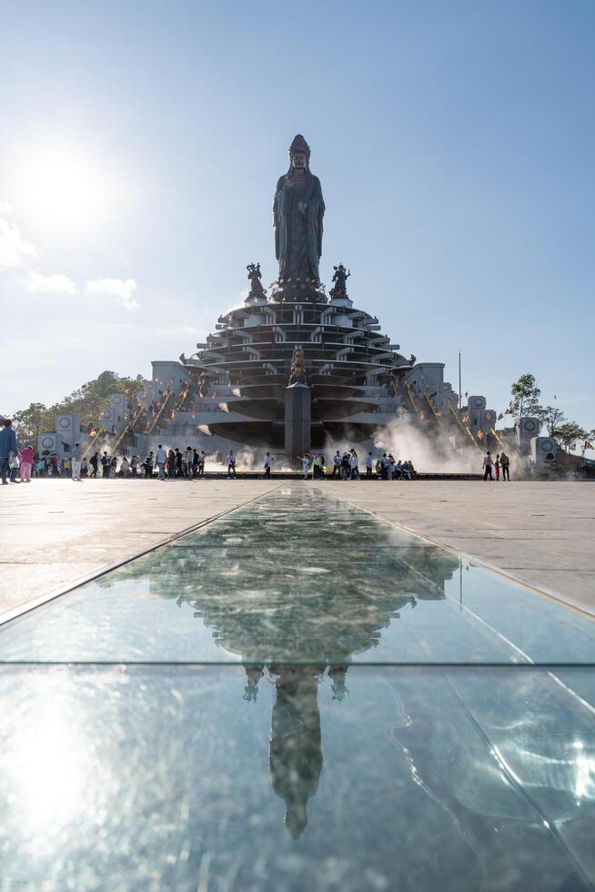 View of Ba Den mountain tourist area, Tay Ninh province, Vietnam. A unique Buddhist architecture with the highest elevation in the area view from below is very beautiful. photo