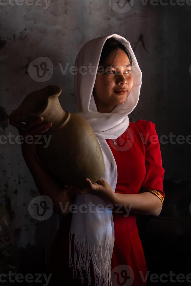 portrait of Cham ethnic girl in Bau Truc pottery village, Phan Rang city, Ninh Thuan province, Vietnam photo