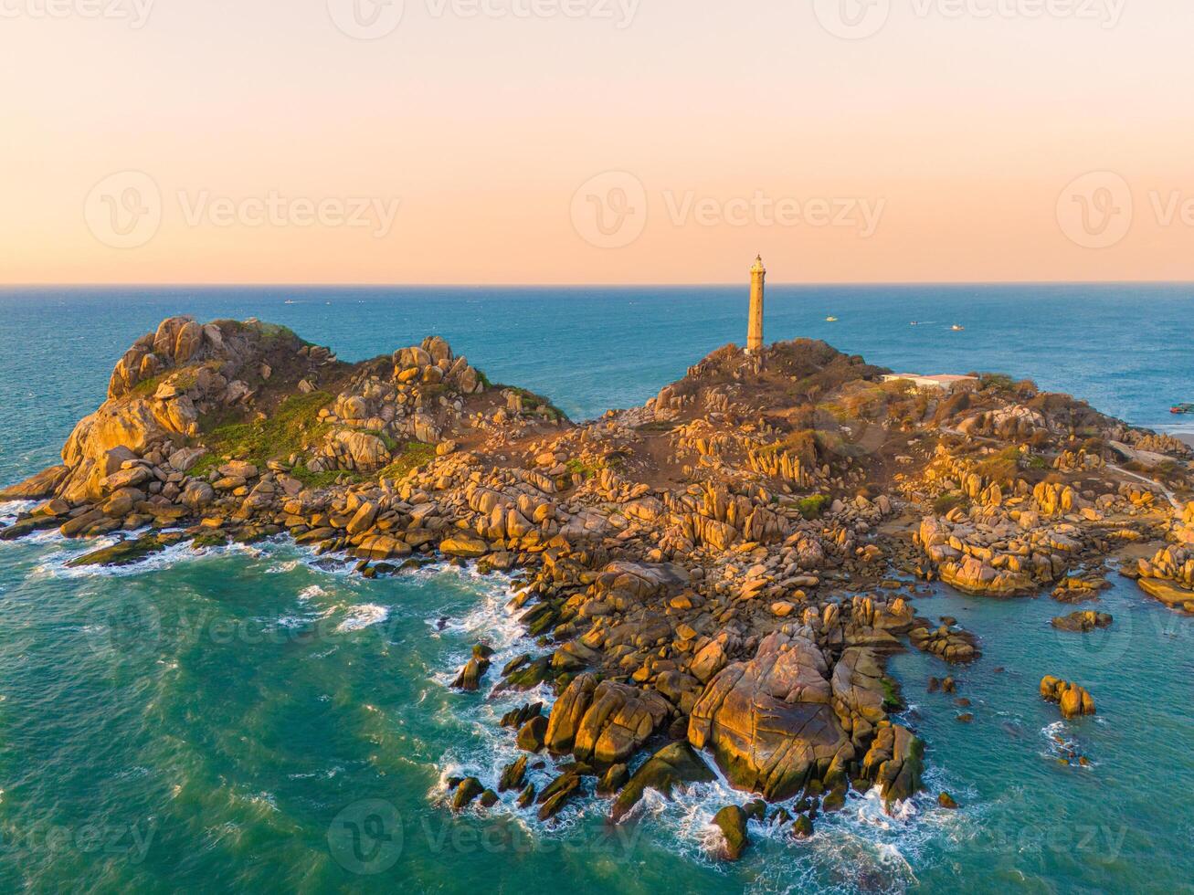 Aerial view of Ke Ga beach at Mui Ne, Phan Thiet, Binh Thuan, Vietnam. Ke Ga Cape or lighthouse is the most favourite destination for visitors. photo