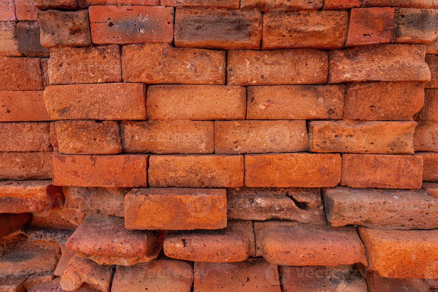 Close up vintage red and brown brick wall background. Grunge background. photo