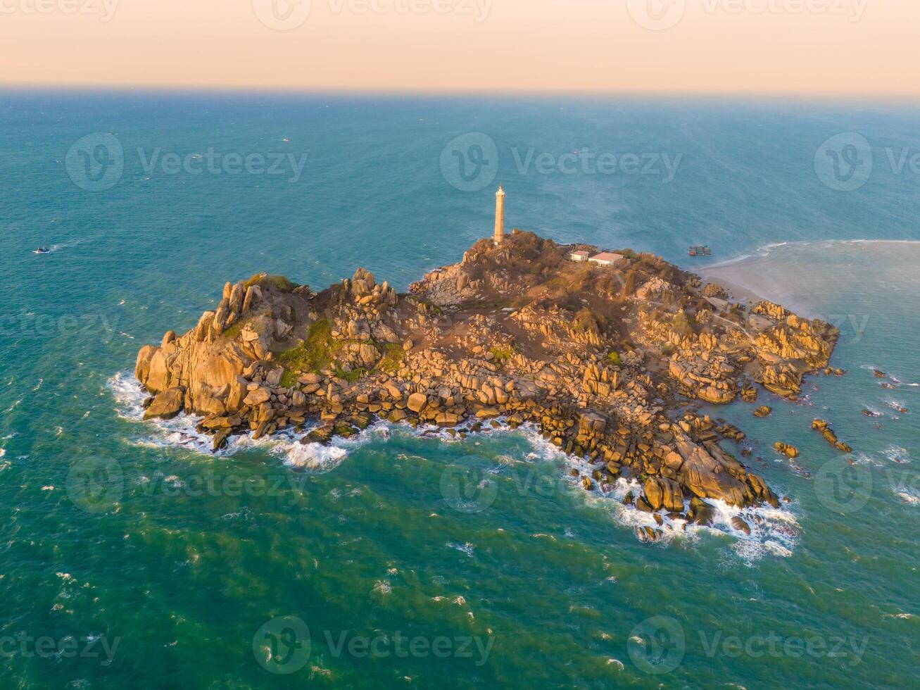 Aerial view of Ke Ga beach at Mui Ne, Phan Thiet, Binh Thuan, Vietnam. Ke Ga Cape or lighthouse is the most favourite destination for visitors. photo