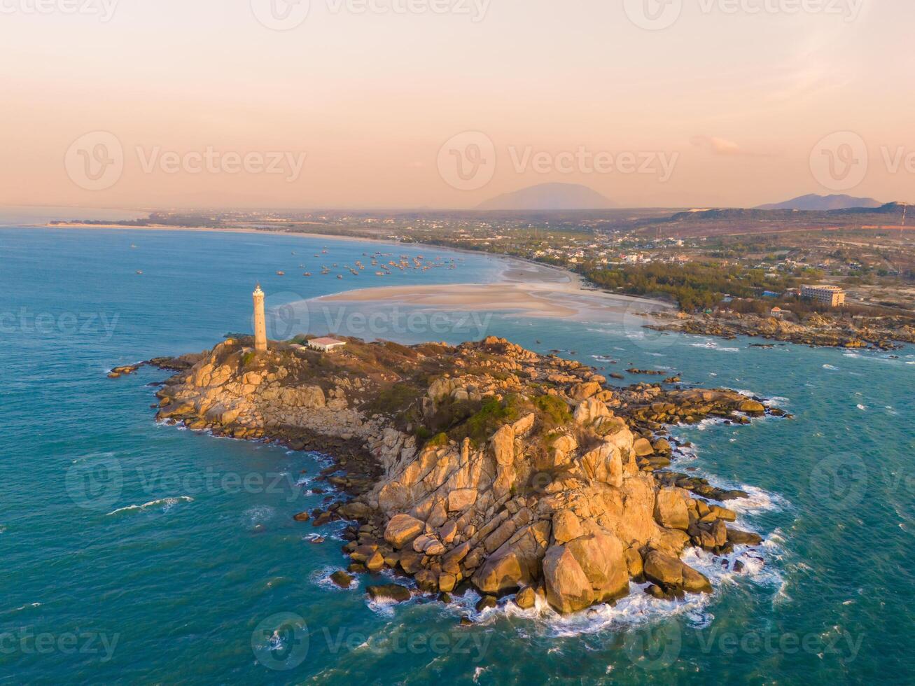 Aerial view of Ke Ga beach at Mui Ne, Phan Thiet, Binh Thuan, Vietnam. Ke Ga Cape or lighthouse is the most favourite destination for visitors. photo