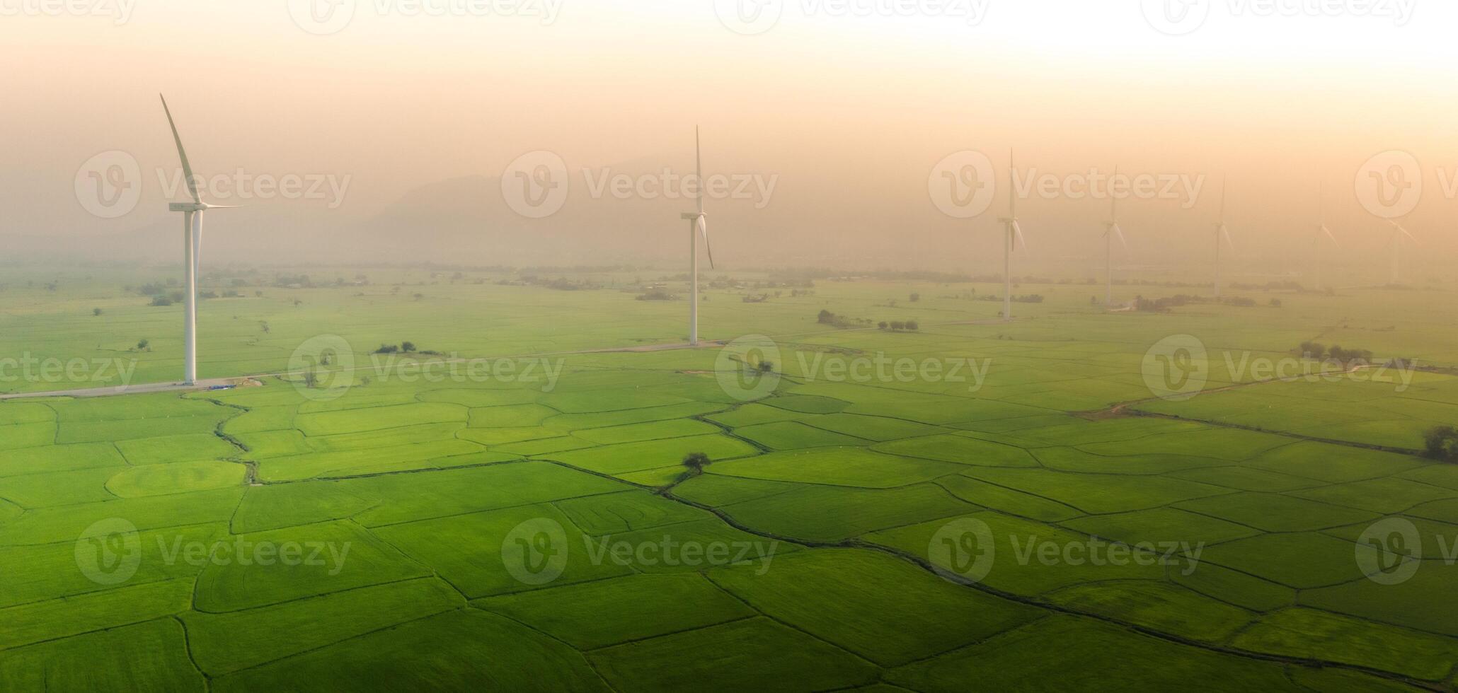 view of turbine green energy electricity, windmill for electric power production, Wind turbines generating electricity on rice field at Phan Rang, Ninh Thuan province, Vietnam photo