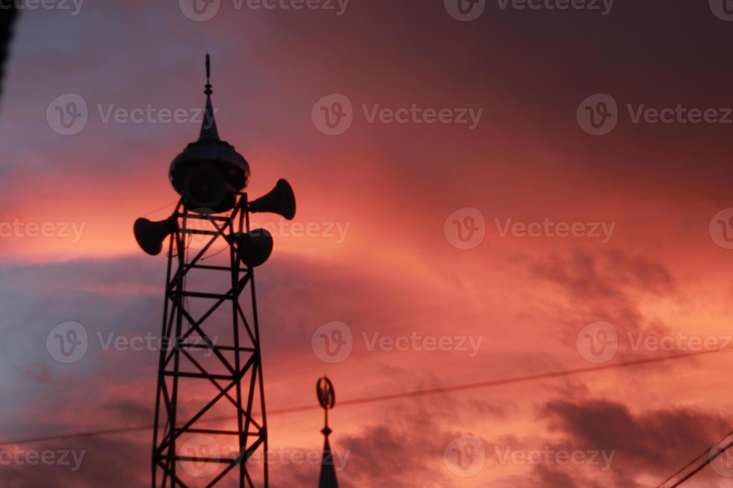 silhouette of the mosque dome against the twilight sky background photo