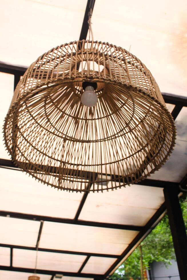 Straw lampshade in modern living room. Eco-friendly interior design using natural materials. photo