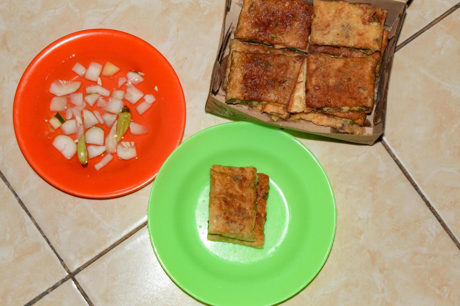 Egg martabak with sliced dish photo