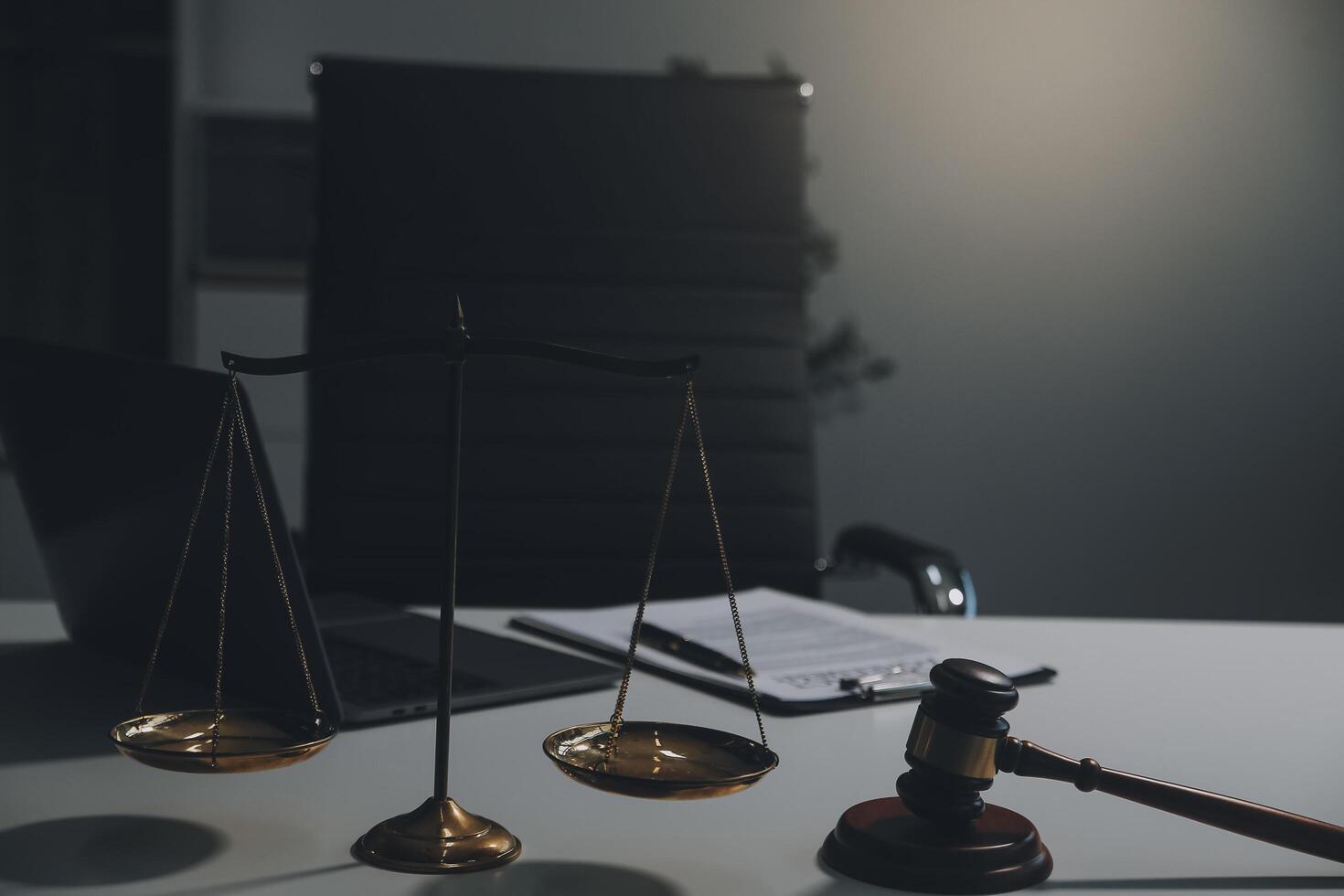 Lawyer, legal advisor, businessman brainstorming information on agreement details Business contracts in legal processing books for accuracy in contract documents. joint financial investment. photo