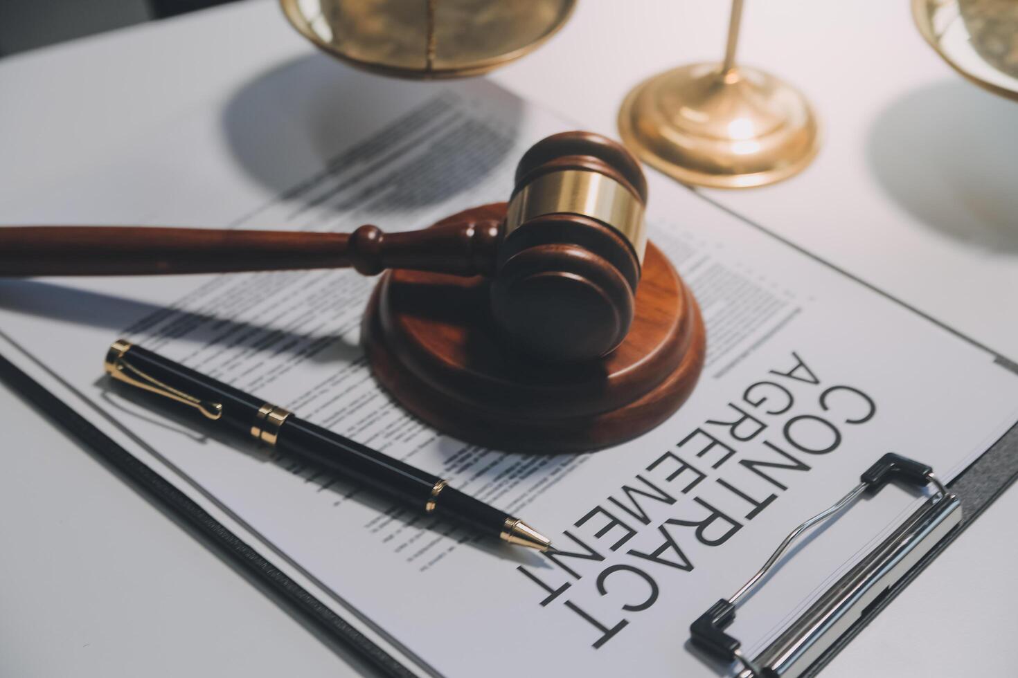 Lawyer, legal advisor, businessman brainstorming information on agreement details Business contracts in legal processing books for accuracy in contract documents. joint financial investment. photo