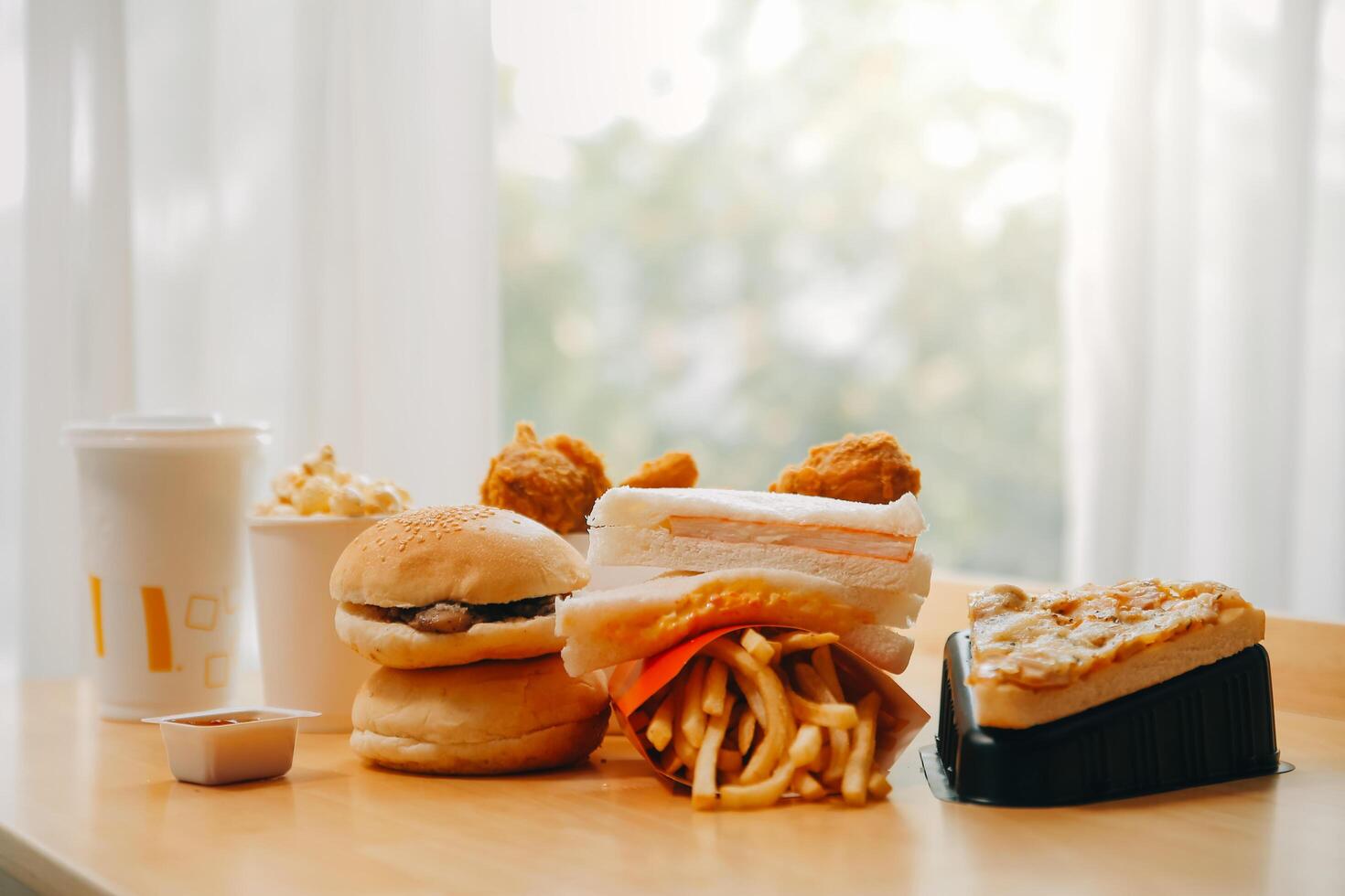 Closeup of home made burgers on wooden background photo