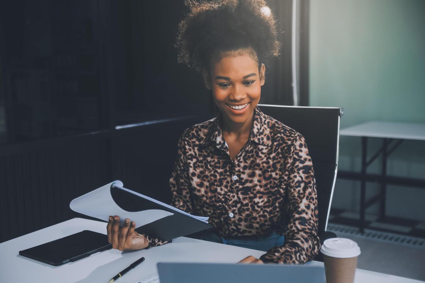 Businesswoman using calculators for do math finance on wooden desks in office and business working background, tax, accounting, statistics, and analytic research concept photo