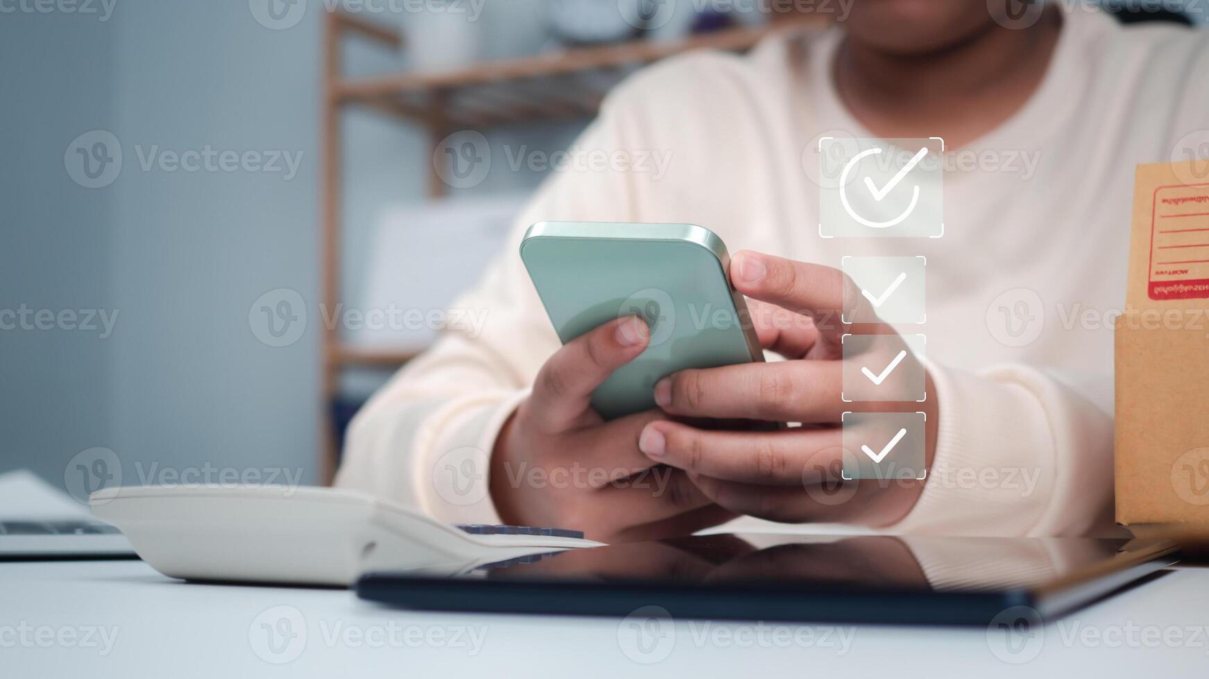 Business women holding smartphone with a checked box on Excellent Smiley Face and Rating for a satisfaction survey, Evaluation of product service quality by customers, Positive customer feedback. photo