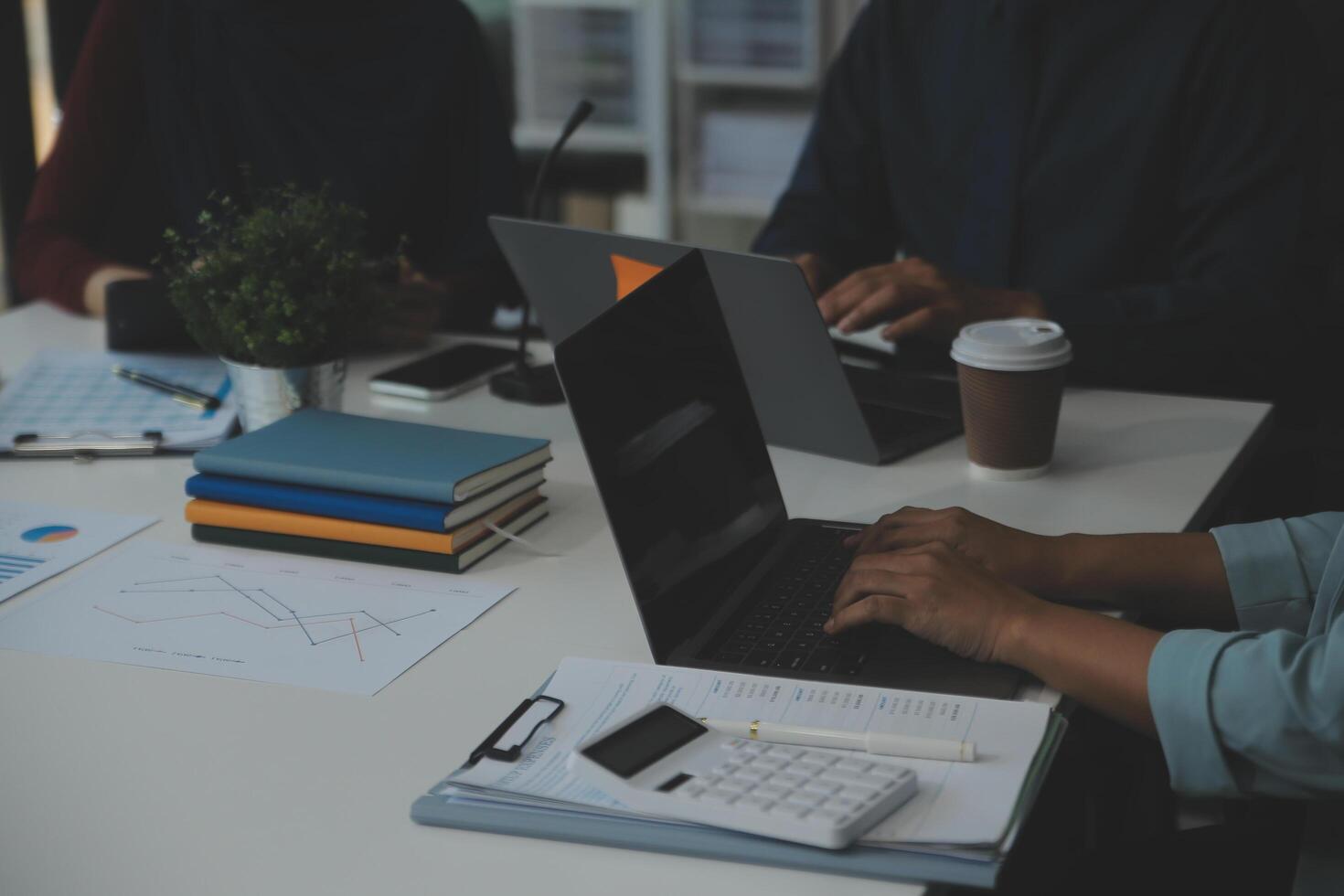 Team of business people working together in the meeting room office, teamwork background charts and graphs banner, double exposure successful teamwork,business planning concept. photo