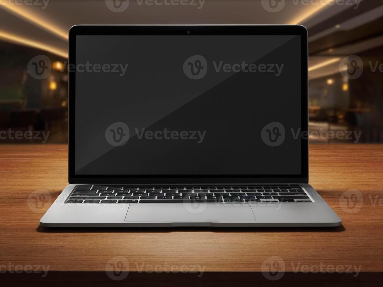 laptop on wooden photo