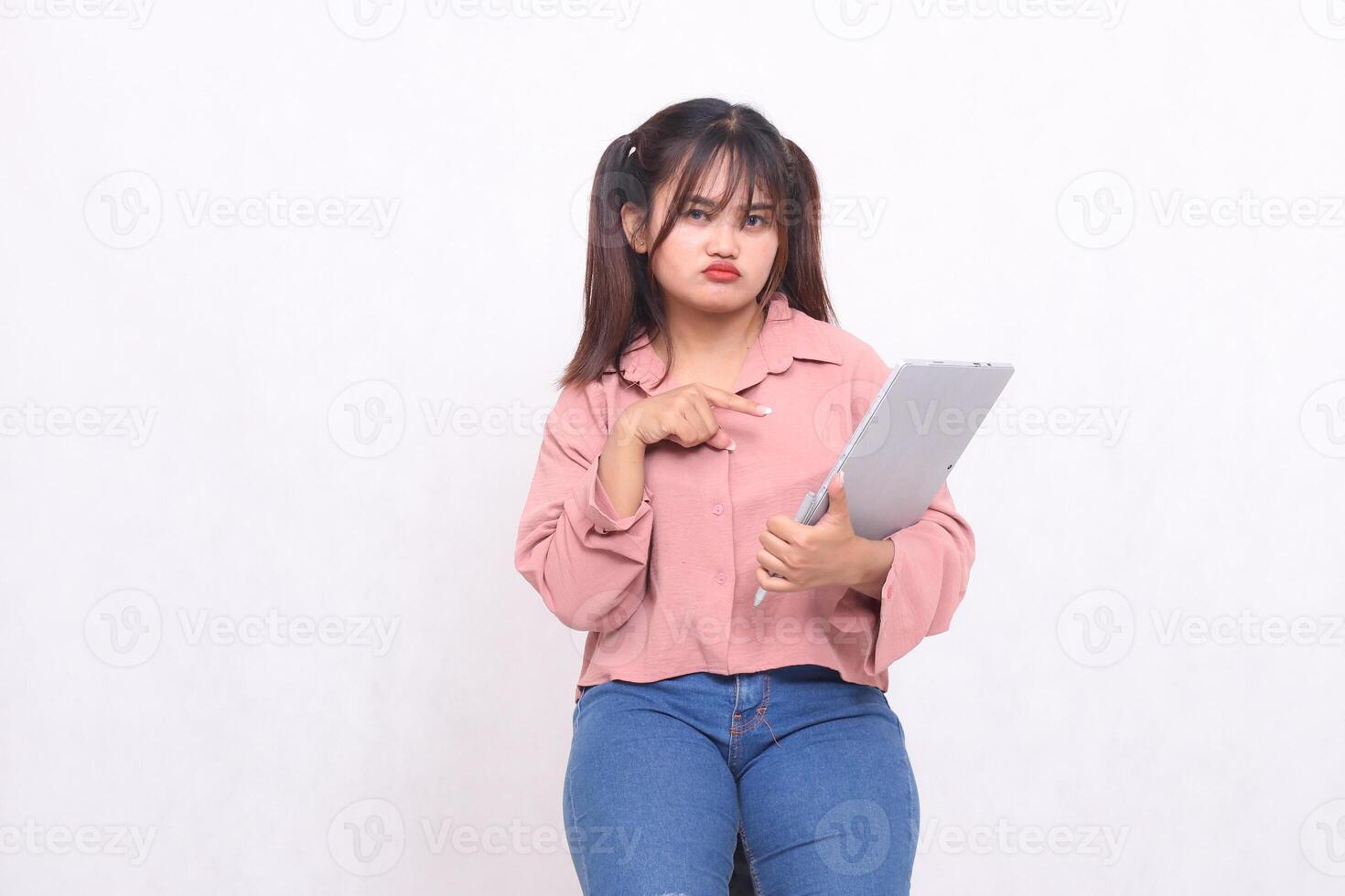 Business, finance and work Improvement projects successful Asian businessman professional stylish frowning woman using laptop holding notebook pointing to notebook looking camera on white background photo