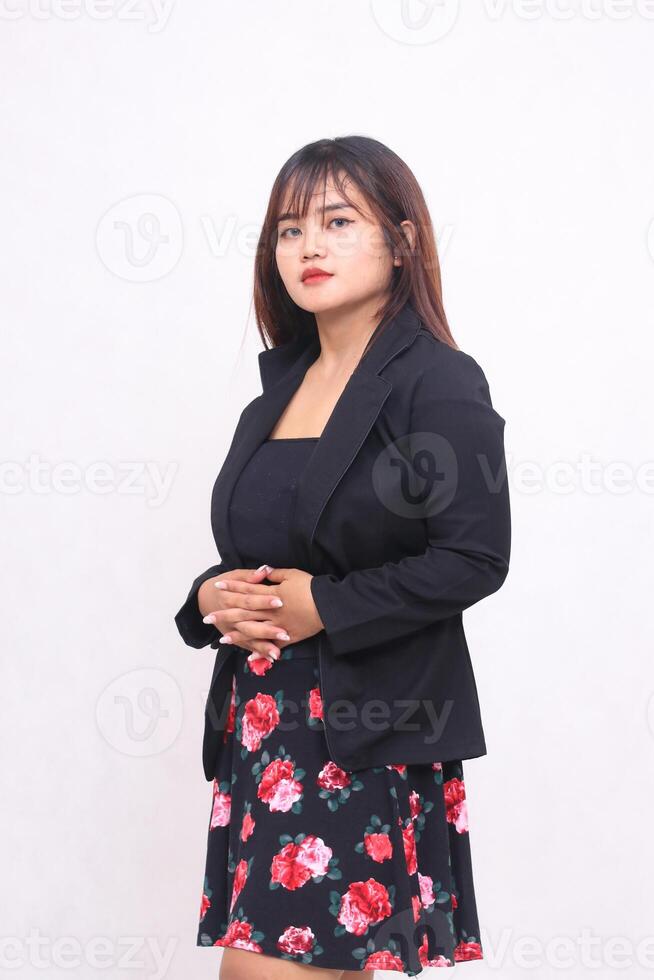 Beautiful Asian Indonesian girl in a suit, casual skirt, professional office, elegant, right-handed, formal with a white background for promotion, advertising, banner photo