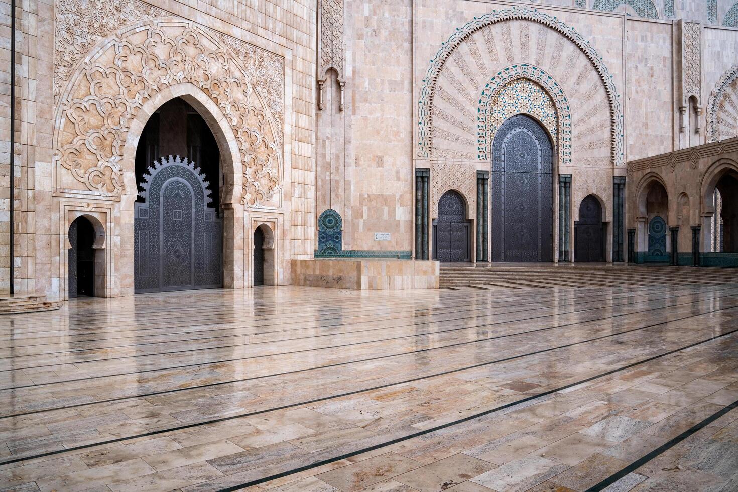 Casablanca, Morocco -march 25, 2024-view of the famous Hassan Second Mosque during a rainy day photo
