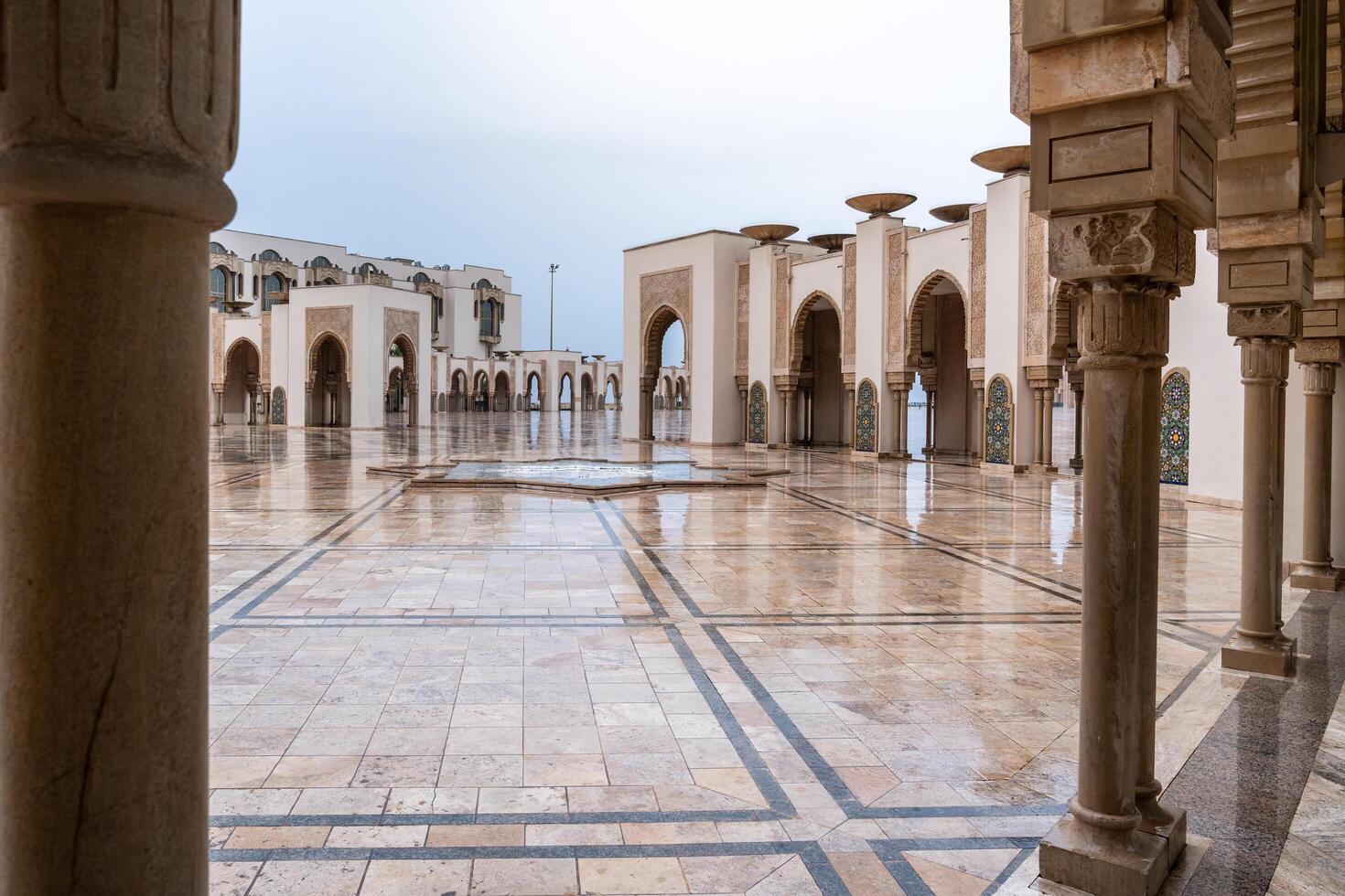 Casablanca, Morocco -march 25, 2024-view of the famous Hassan Second Mosque during a rainy day photo
