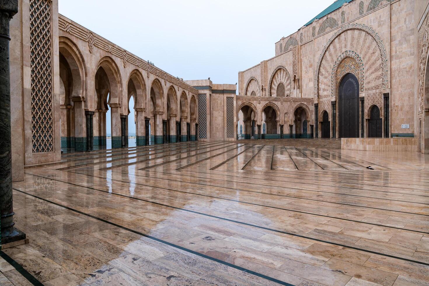 Casablanca, Morocco -march 25, 2024-view of the famous Hassan Second Mosque during a rainy day photo