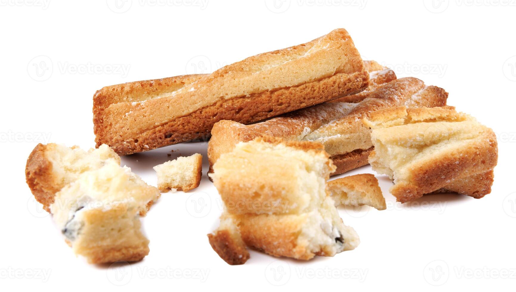 A couple of whole and one crumbled cookies isolated on a white background. photo