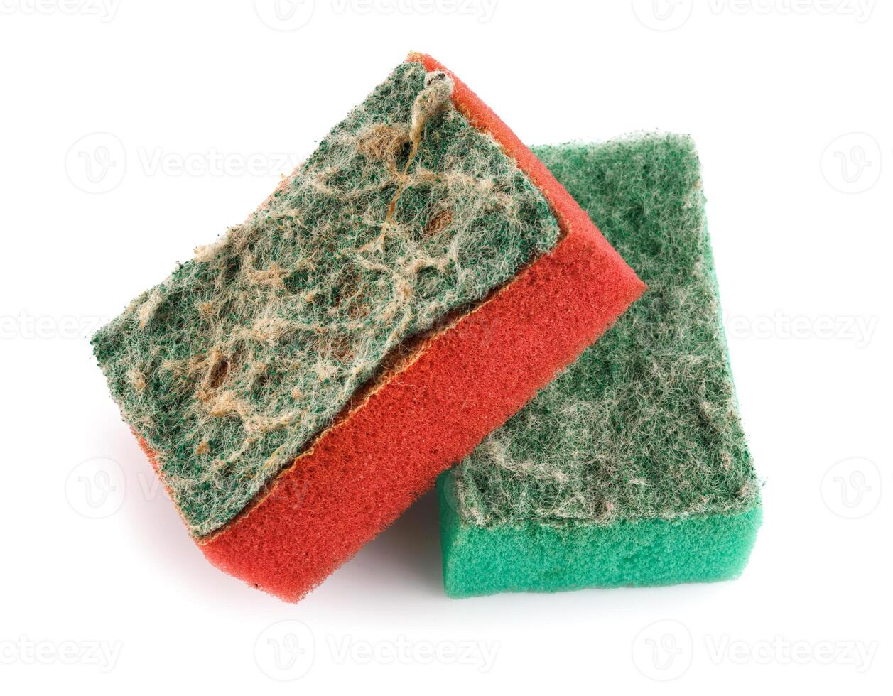 Old, used dishwashing sponge isolated on a white background. photo