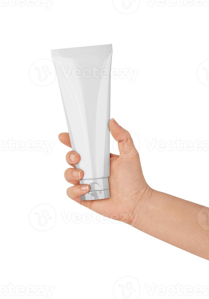 Tube Cosmetic in Woman Hand on white background photo