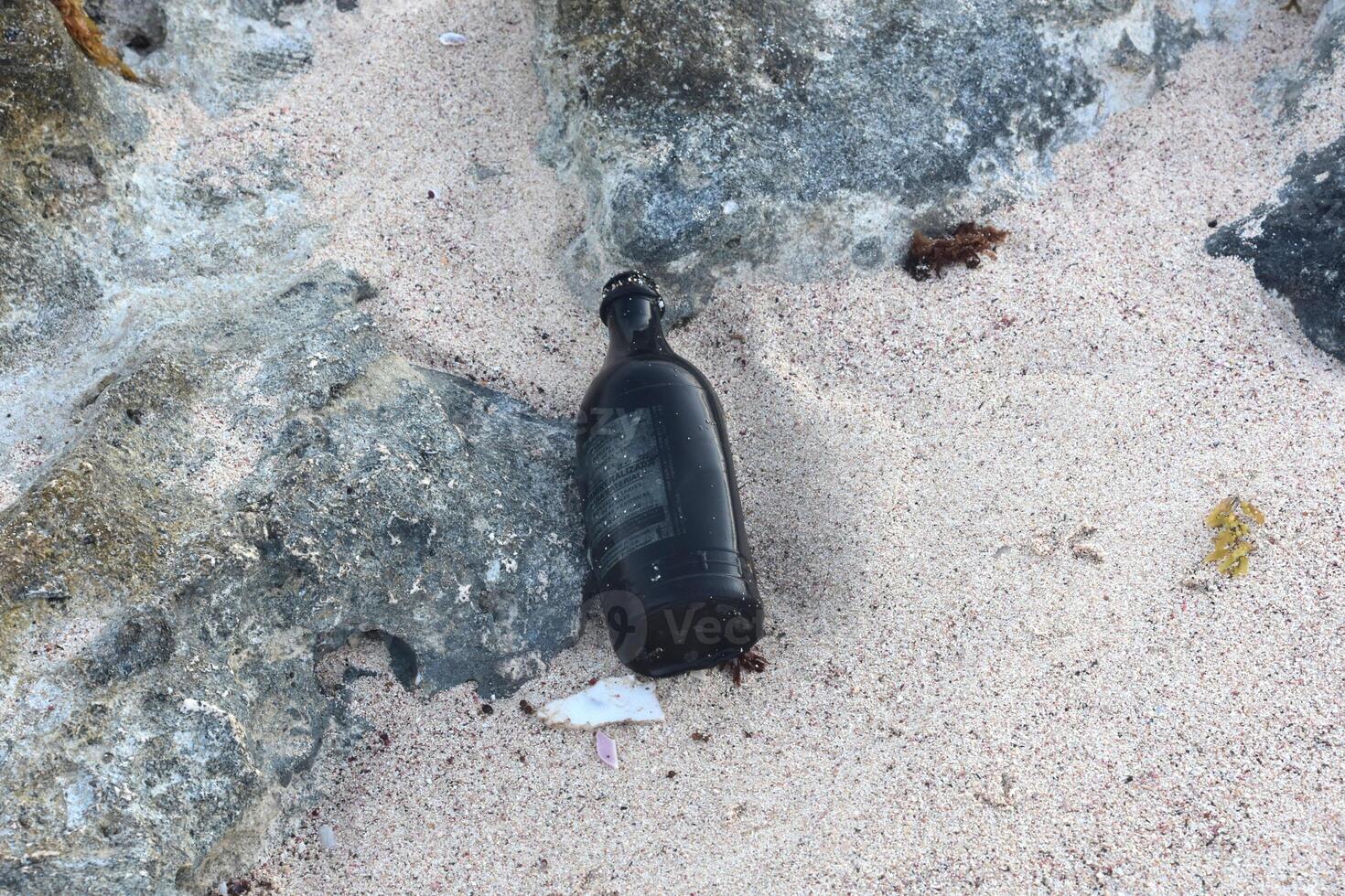 Brown Bottle on a Beach in the Dutch Antilles photo