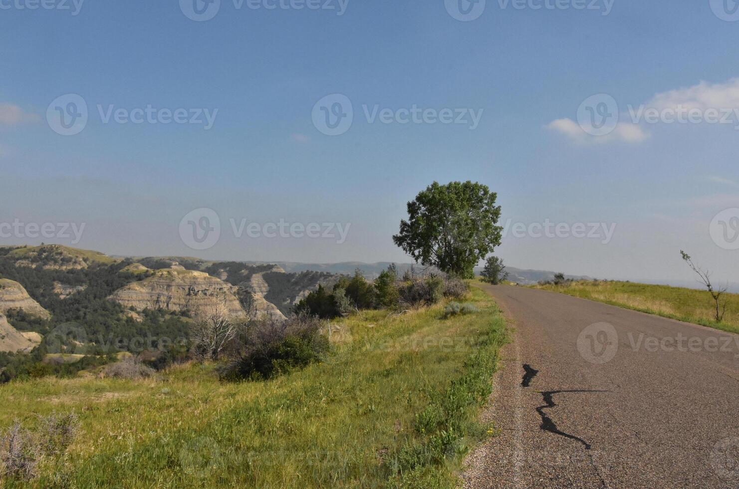 Road Way Through Stunning Landscape in North Dakota photo