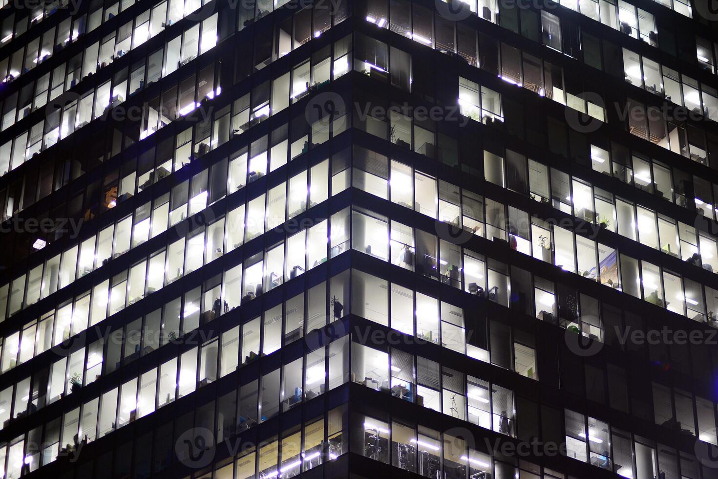Modern office building at night. Night lights, city office building downtown, cityscape view photo