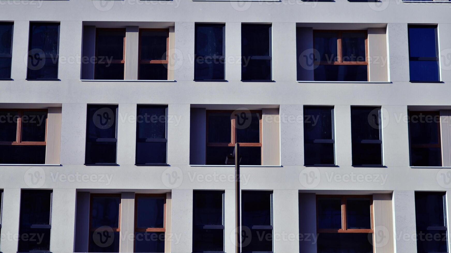 Residential area with modern apartment building. Facade of a modern apartment building. photo