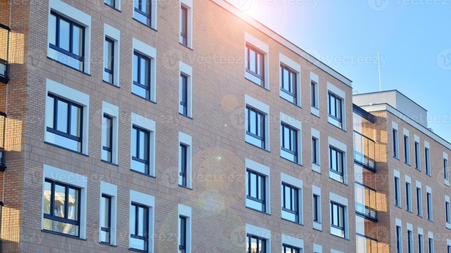Residential area with modern apartment building. Multi Storey modern, new and stylish living block of flats. photo