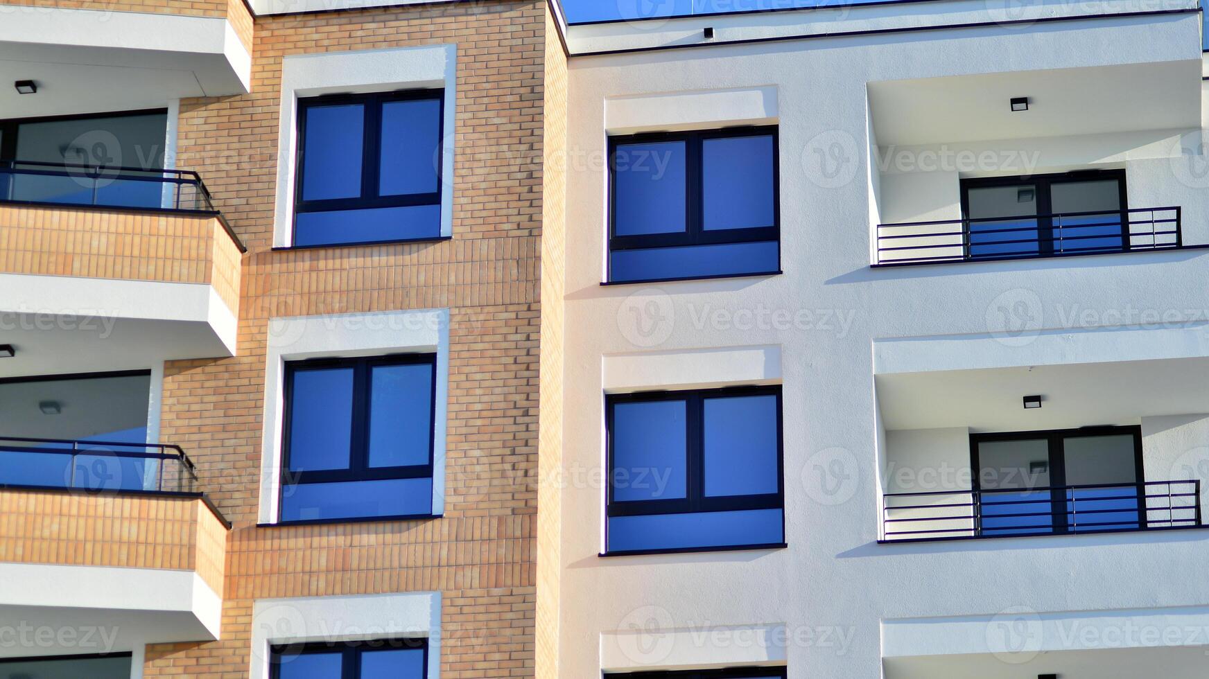 Residential area with modern apartment building. Multi Storey modern, new and stylish living block of flats. photo