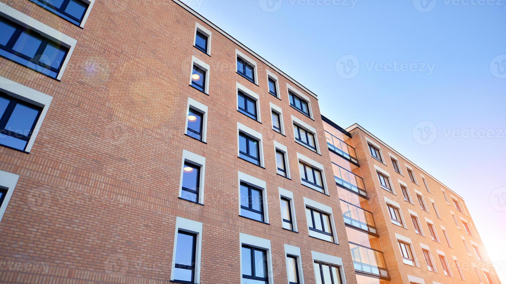 Residential area with modern apartment building. Multi Storey modern, new and stylish living block of flats. photo