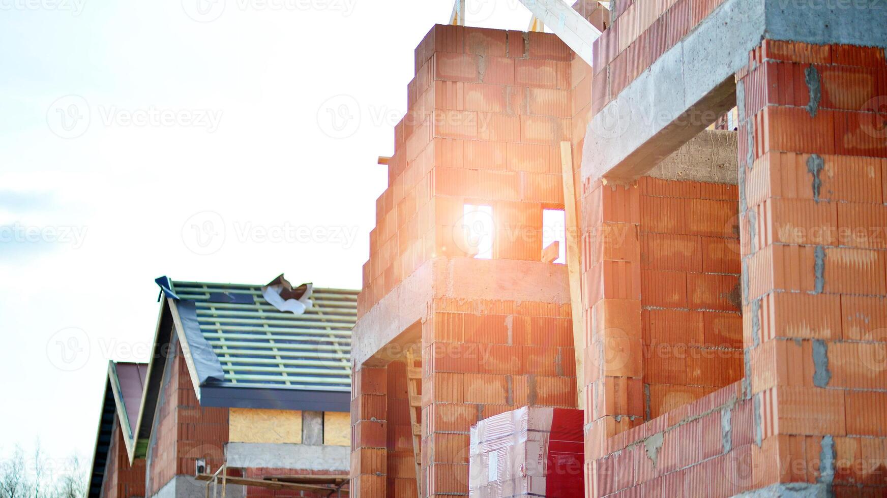 Single-family house under construction in an development estate of small single-family houses. photo