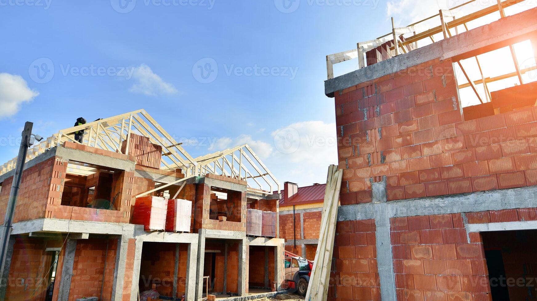 Single-family house under construction in an development estate of small single-family houses. photo