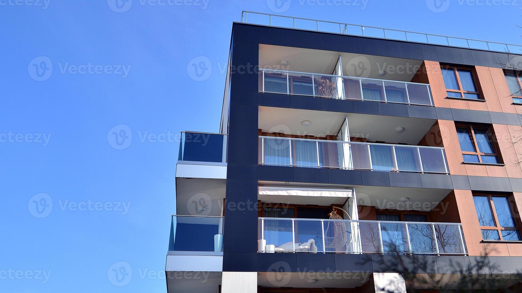 Modern architecture of urban residential apartment building. Apartment building exterior, residential house facade. photo