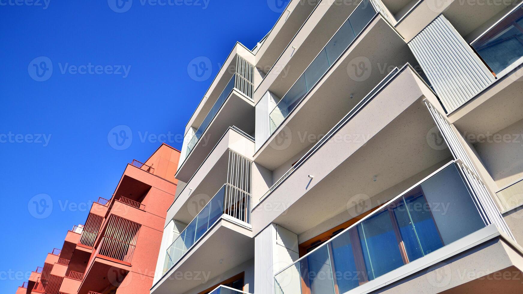 Modern architecture of urban residential apartment building. Apartment building exterior, residential house facade. photo