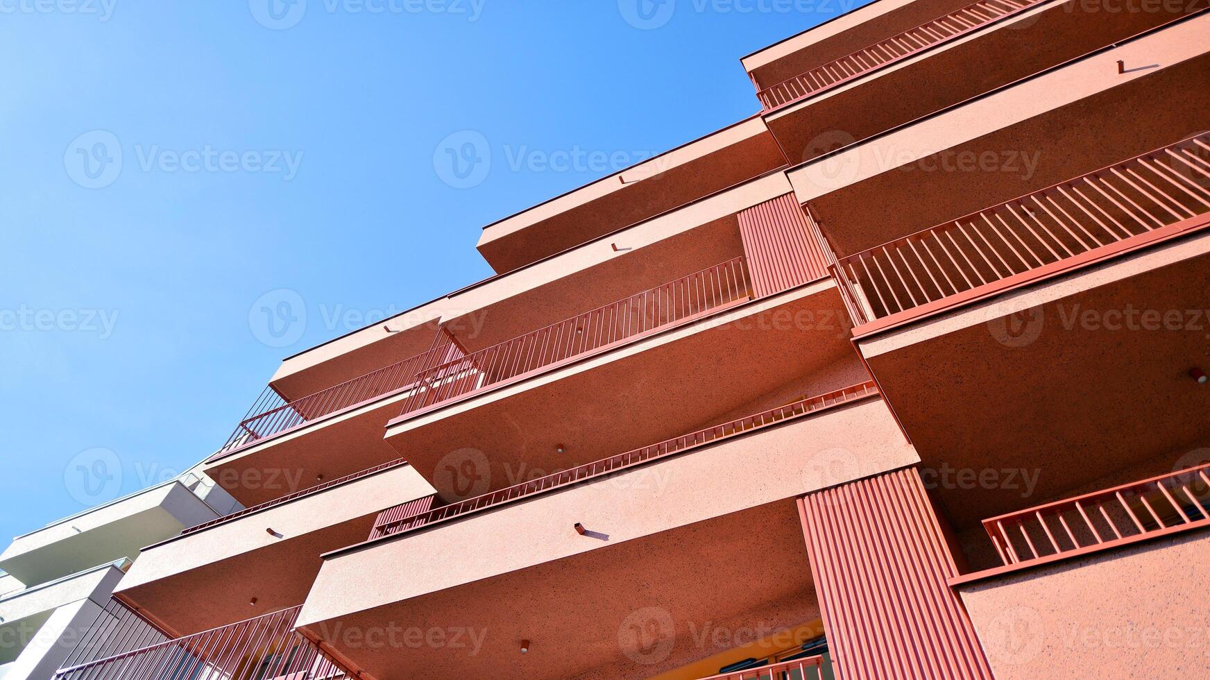 Modern architecture of urban residential apartment building. Apartment building exterior, residential house facade. photo