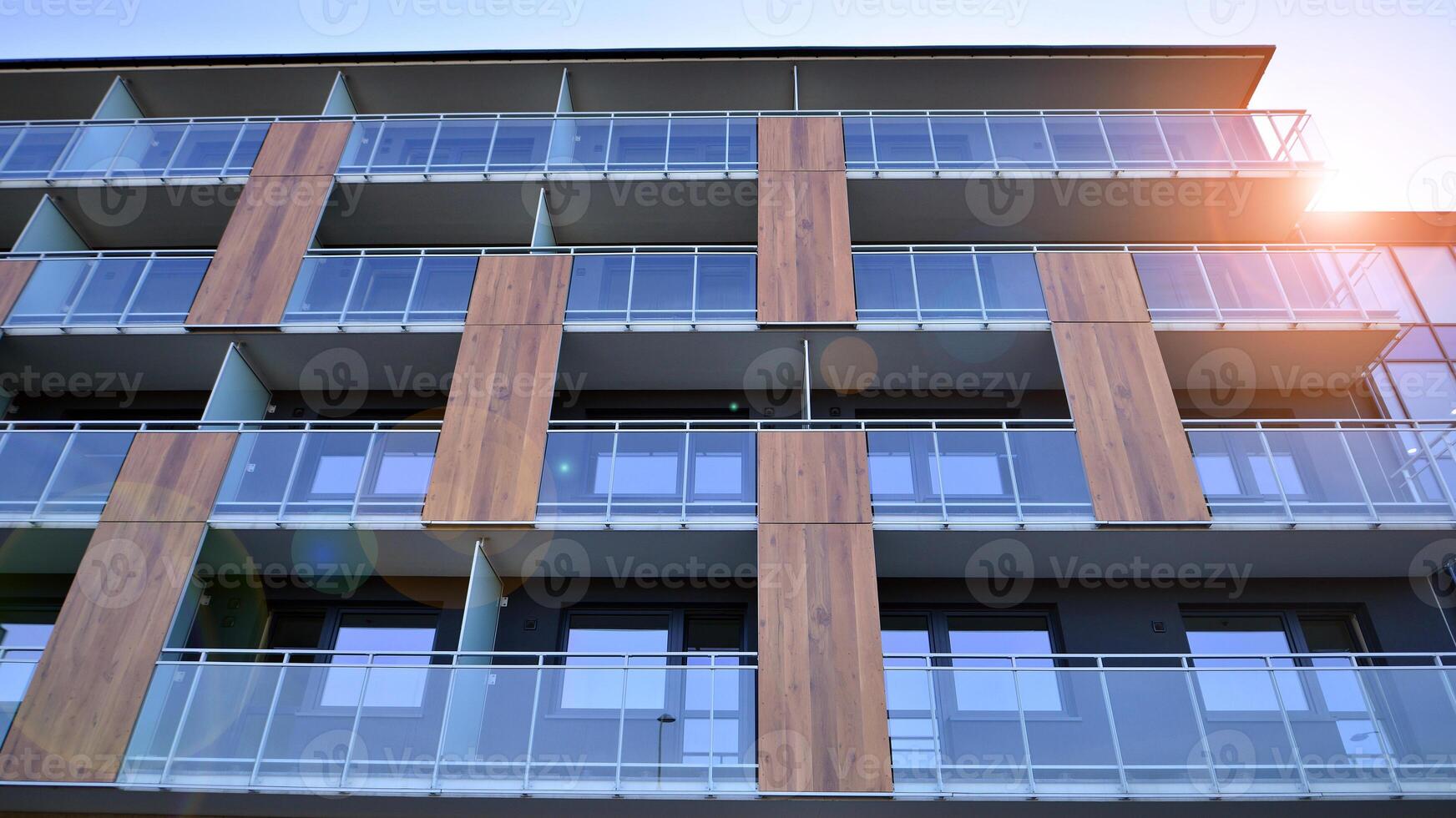 Modern architecture of urban residential apartment building. Apartment building exterior, residential house facade. photo