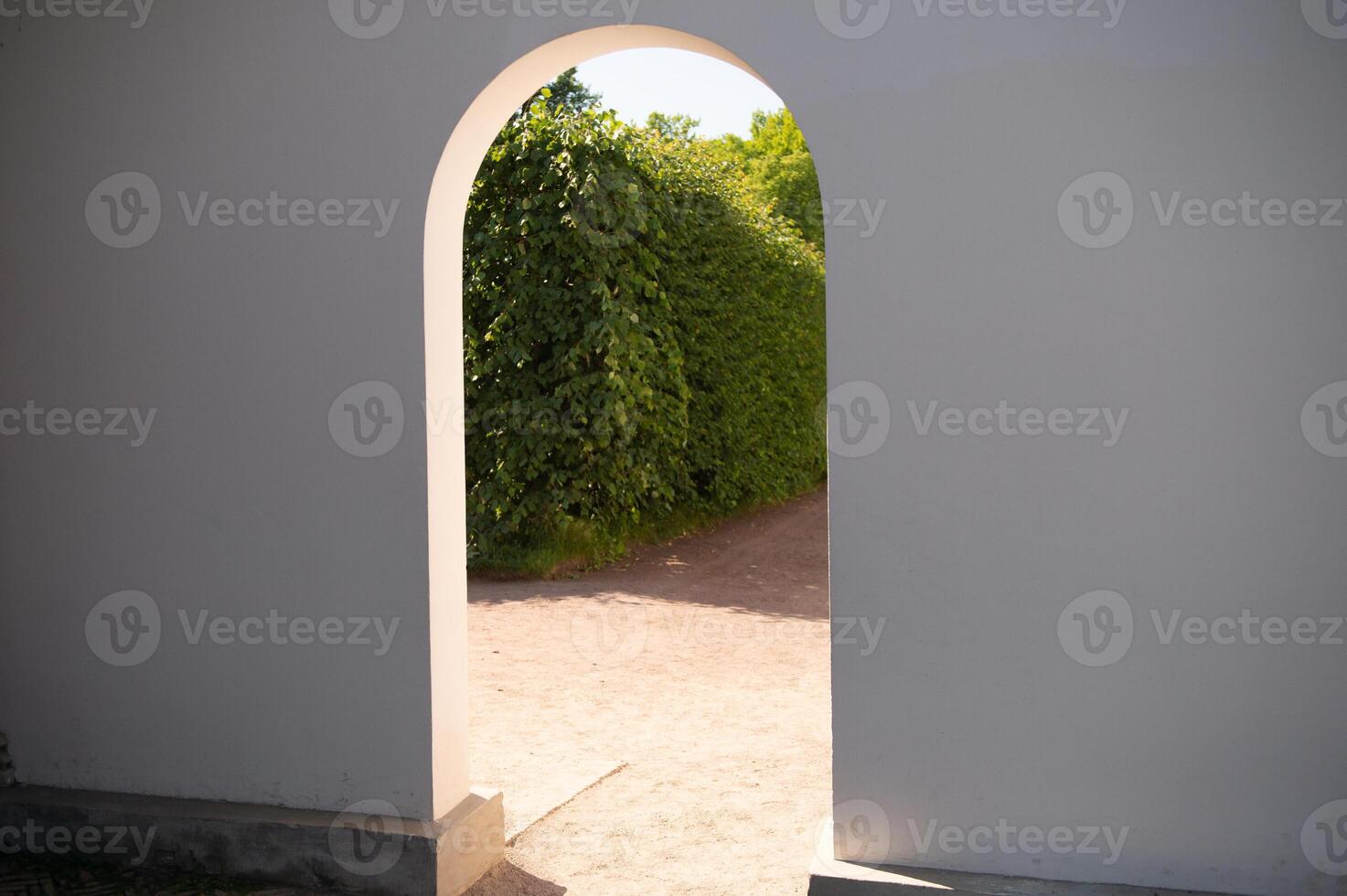 Archway Entrance to Lush Green Garden photo