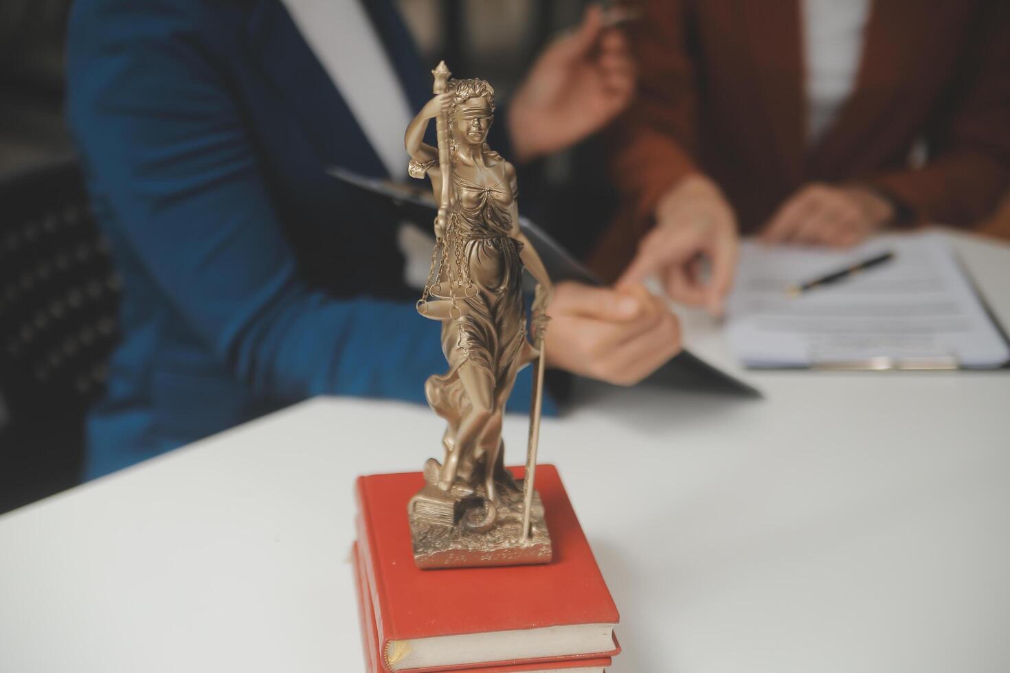 Lawyer, legal advisor, businessman brainstorming information on agreement details Business contracts in legal processing books for accuracy in contract documents. joint financial investment. photo