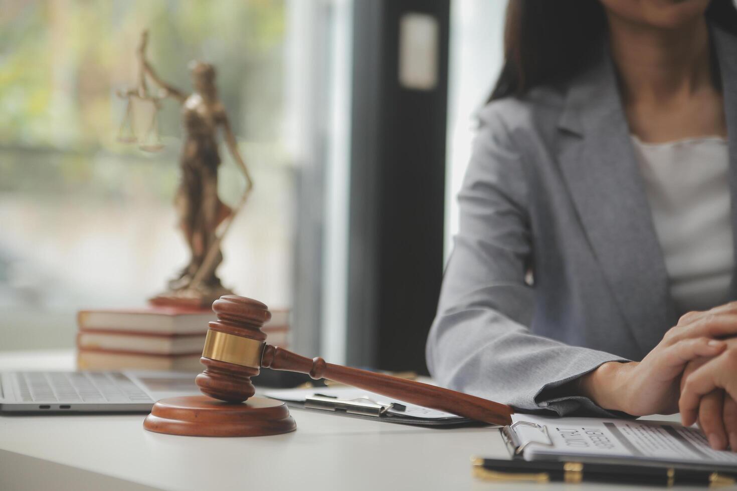 Lawyer, legal advisor, businessman brainstorming information on agreement details Business contracts in legal processing books for accuracy in contract documents. joint financial investment. photo
