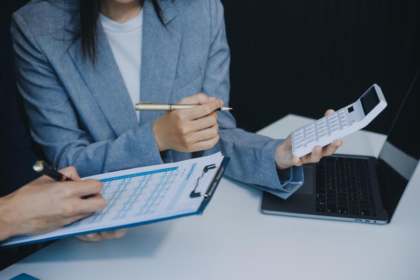 Business Documents, Auditor businesswoman checking searching document legal prepare paperwork or report for analysis TAX time,accountant Documents data contract partner deal in workplace office photo