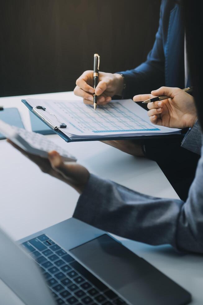 Business Documents, Auditor businesswoman checking searching document legal prepare paperwork or report for analysis TAX time,accountant Documents data contract partner deal in workplace office photo