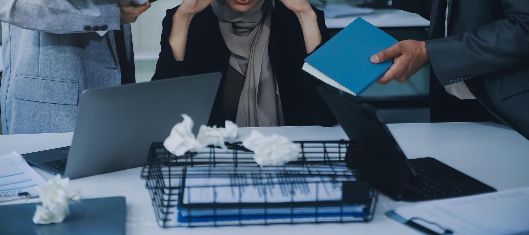 Stressful business man have so many paperwork in the office photo